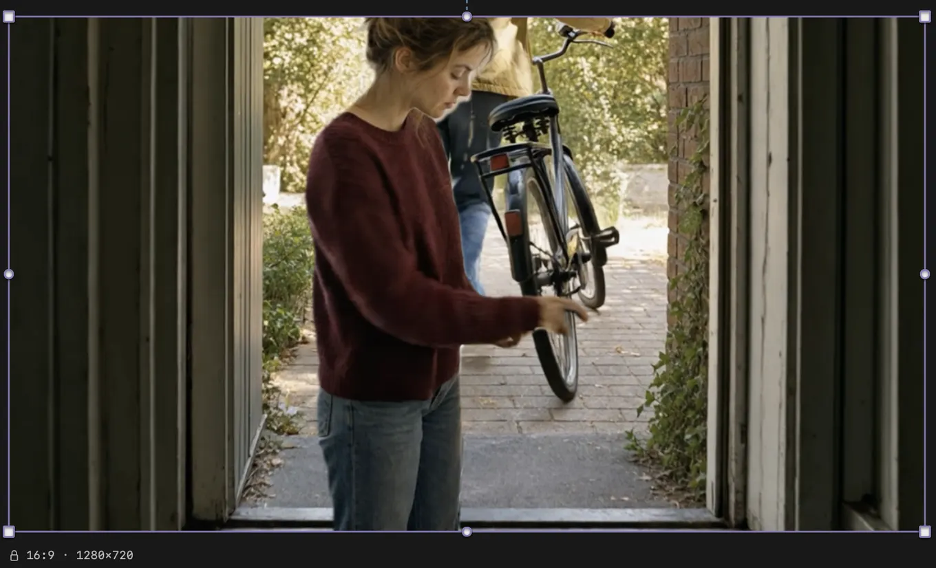 The same woman cut out of her bedroom and placed in a doorway from the clip on the track below